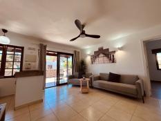Lounge with air-con and ceiling fan 